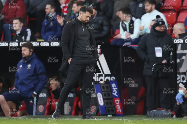 190222 - Sheffield United v Swansea City - Sky Bet Championship - Head Coach Russell Martin  of Swansea dejected near the end of the match losing 4-0