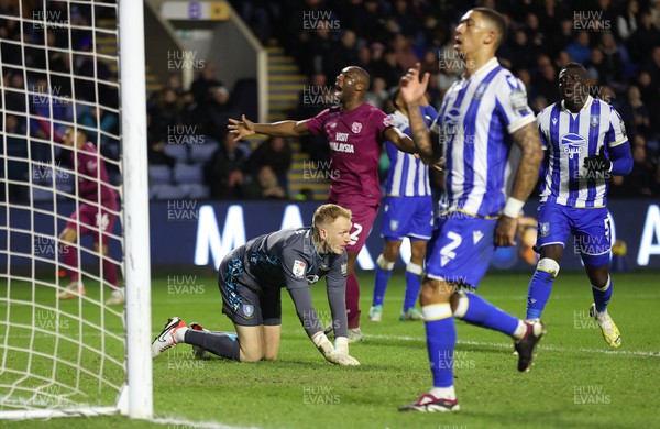 231223 - Sheffield Wednesday v Cardiff City - Sky Bet Championship - Yakou Meite of Cardiff cele on goal scored by Karlan Grant of Cardiff [behind goal]