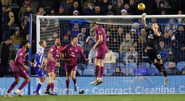 231223 - Sheffield Wednesday v Cardiff City - Sky Bet Championship - Goalkeeper Jak Alnwick of Cardiff punches away the ball in the 2nd half