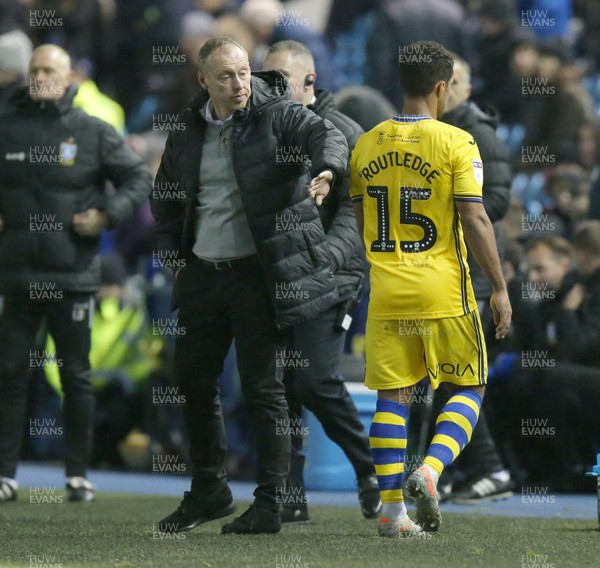 091119 - Sheffield Wednesday v Swansea City - Sky Bet Championship -  Wayne Routledge of Swansea is subbed in the 2nd half and comes off the pitch to be welcomed by Manager Steve Cooper  of Swansea