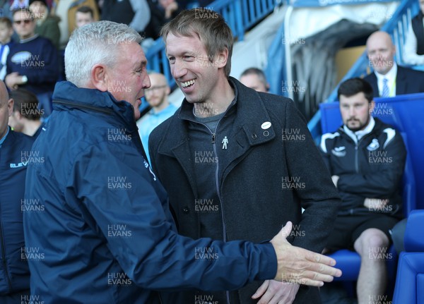 230219 - Sheffield Wednesday v Swansea City - Sky Bet Championship - Manager Steve Bruce of Sheffield Wednesday greets Manager Graham Potter  of Swansea before the start of the match 