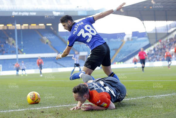 230219 - Sheffield Wednesday v Swansea City - Sky Bet Championship - Achraf Lazaar of Sheffield Wednesday and Connor Roberts  of Swansea tussle on the goal line 