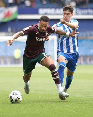 300825 - Sheffield Wednesday v Swansea City - Sky Bet Championship - Ronald of Swansea and Olaf Kobacki of Sheffield Wednesday