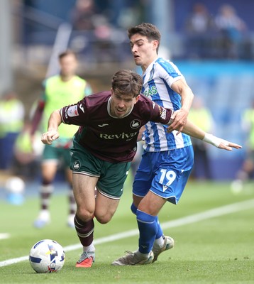 300825 - Sheffield Wednesday v Swansea City - Sky Bet Championship - Joshua Key of Swansea and Olaf Kobacki of Sheffield Wednesday