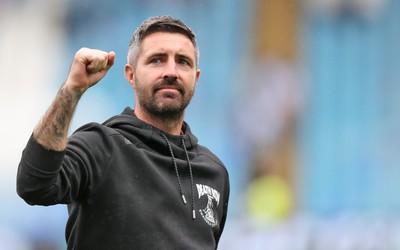 300825 - Sheffield Wednesday v Swansea City - Sky Bet Championship - Swansea manager Alan Sheehan applauds the travelling fans at the end of the match
