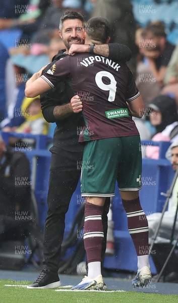 300825 - Sheffield Wednesday v Swansea City - Sky Bet Championship - Zan Vipotnik of Swansea is saluted by Swansea manager Alan Sheehan as he is substituted