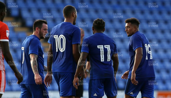 250717 - Shrewsbury Town v Cardiff City - Pre Season Friendly - Nathaniel Mendez-Laing (right) of Cardiff City celebrates with team mates after scoring a goal