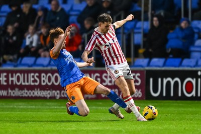 151125 - Shrewsbury Town v Newport County - Sky Bet League 2 - Ben Lloyd of Newport County is fouled by Tommy McDermott of Shrewsbury Town