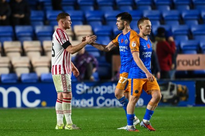 151125 - Shrewsbury Town v Newport County - Sky Bet League 2 - Lee Jenkins of Newport County and John Marquis of Shrewsbury Town shake hands at the end of the game