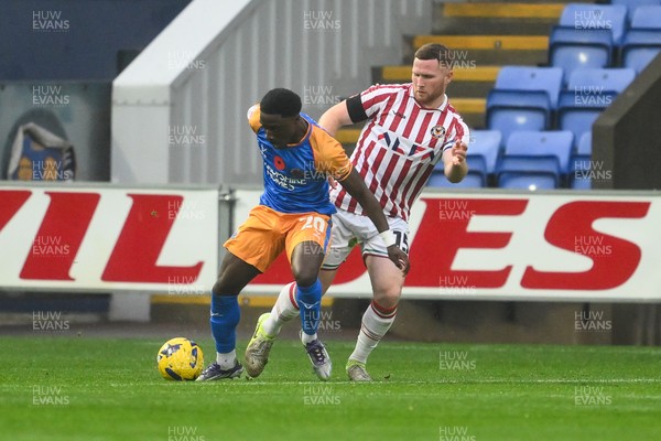 151125 - Shrewsbury Town v Newport County - Sky Bet League 2 - Lee Jenkins of Newport County and Ismeal Kabia of Shrewsbury Town battles for the ball