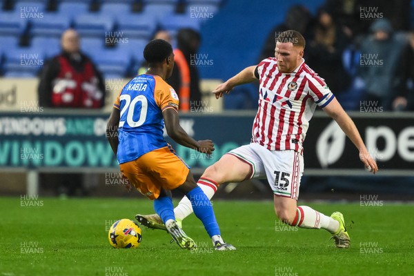 151125 - Shrewsbury Town v Newport County - Sky Bet League 2 - Lee Jenkins of Newport County tackles Ismeal Kabia of Shrewsbury Town