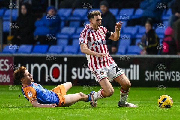 151125 - Shrewsbury Town v Newport County - Sky Bet League 2 - Ben Lloyd of Newport County is fouled by Tommy McDermott of Shrewsbury Town