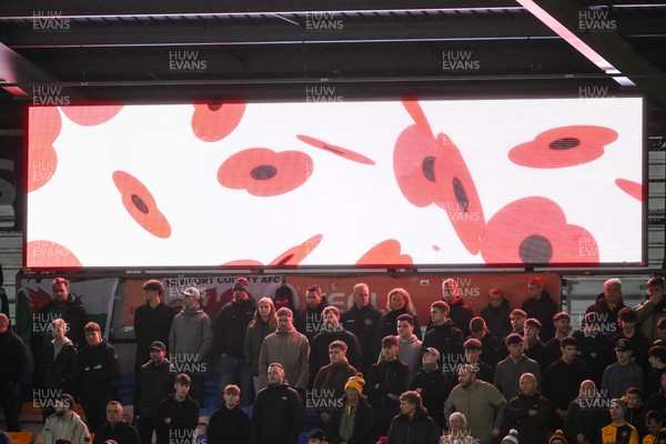 151125 - Shrewsbury Town v Newport County - Sky Bet League 2 - Newport County Fan observe the minutes silence before the game