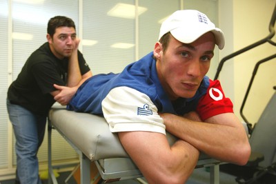 140203 - Glamorgan and England cricketer Simon Jones receiving treatment for his injury from Erjan Mustafa, sports osteopath/physio at Sophia Gardens, Cardiff