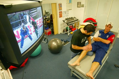 140203 - Glamorgan and England cricketer Simon Jones watches the Cricket World Cup on television as he receives treatment for his injury at Sophia Gardens, Cardiff