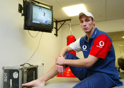 140203 - Glamorgan and England cricketer Simon Jones watches the Cricket World Cup on television after receiving treatment for his injury at Sophia Gardens, Cardiff