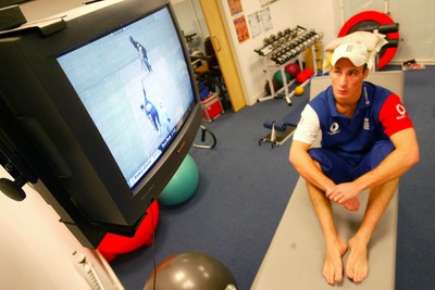 140203 - Glamorgan and England cricketer Simon Jones watches the Cricket World Cup on television after receiving treatment for his injury at Sophia Gardens, Cardiff