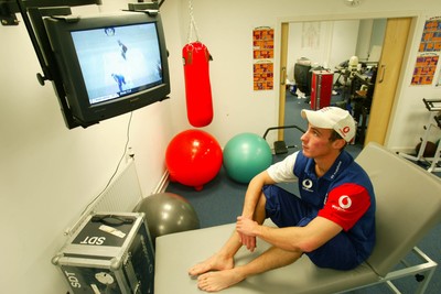 140203 - Glamorgan and England cricketer Simon Jones watches the Cricket World Cup on television after receiving treatment for his injury at Sophia Gardens, Cardiff