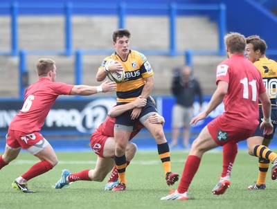 150815 - Singha Premiership Rugby 7sBlues Owen Jenkins is surrounded by the Scarlets defence