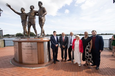 050925 - The Rugby Code Breaker statue in Cardiff Bay has had a new name plaque after William �Billy� Boston has received his knighthood - Billy with wife Joan and son Stephen with Cllr Huw Thomas, Gaynor Legall CBE and Stephen Doughty MP
