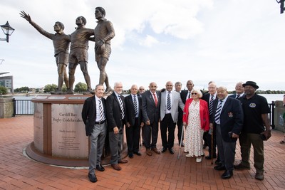 050925 - The Rugby Code Breaker statue in Cardiff Bay has had a new name plaque after William �Billy� Boston has received his knighthood - Billy with wife Joan and son along with members of CIACS rugby club