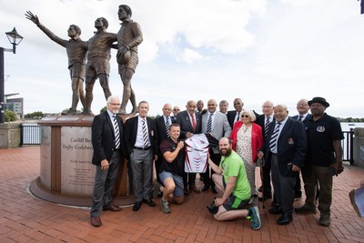 050925 - The Rugby Code Breaker statue in Cardiff Bay has had a new name plaque after William �Billy� Boston has received his knighthood - Billy with wife Joan and son along with members of CIACS rugby club