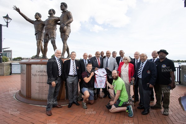050925 - The Rugby Code Breaker statue in Cardiff Bay has had a new name plaque after William �Billy� Boston has received his knighthood - Billy with wife Joan and son along with members of CIACS rugby club