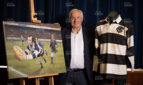060722 - The Greatest Try Anniversary with Sir Gareth Edwards - Sir Gareth Edwards with his Barbarian shirt worn when he scored “The Greatest Try” against New Zealand in 1973 and a specially commissioned painting to mark Sir Gareth’s 75th birthday, 50th wedding anniversary and 50 years since scoring that try