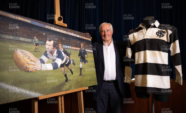 060722 - The Greatest Try Anniversary with Sir Gareth Edwards - Sir Gareth Edwards with his Barbarian shirt worn when he scored “The Greatest Try” against New Zealand in 1973 and a specially commissioned painting to mark Sir Gareth’s 75th birthday, 50th wedding anniversary and 50 years since scoring that try