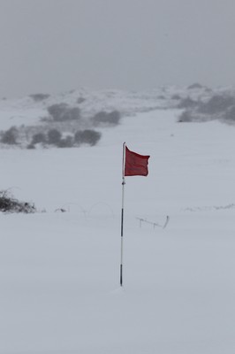 180113 - Snow in South Wales - No Golf today - snow covers the course at Pyle and Kenfig Golf Course near Porthcawl