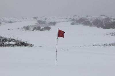 180113 - Snow in South Wales - No Golf today - snow covers the course at Pyle and Kenfig Golf Course near Porthcawl