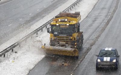 180113 - Cardiff- Snow -   A Snow plough attempts to keep the M4 between Bridgend and Pyle open as snow falls heavily in South Wales 