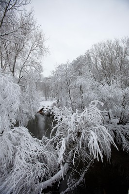 180113 - Snow hits south Wales -Snow creates a magical scene over one of the small rivers near Hirwain, south Wales