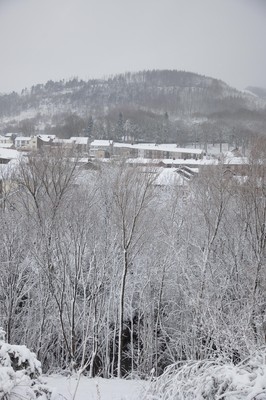 180113 - Snow hits south Wales -Snow covered valley houses near Mountain Ash, south Wales