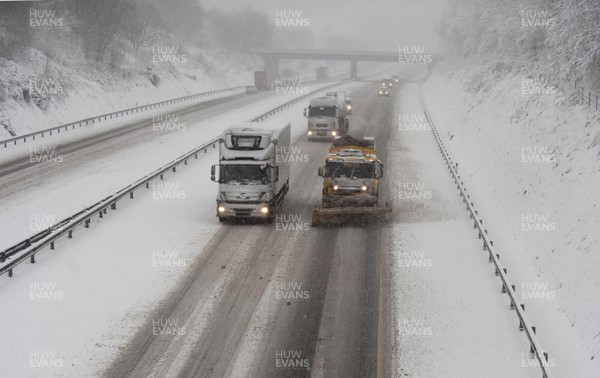 180113 - M4- Snow -   A Snow plough attempts to keep the M4 at Cardiff open as snow falls heavily in South Wales 