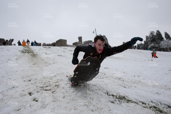 180113 - Snow hits south Wales -Sledgers take to the snow at Cyfarthfa Castle in Merthyr Tydfil