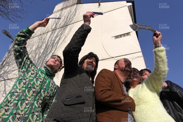 200315 - Picture shows residents of Eclipse Street, Adamstown, Cardiff watching the solar eclipse