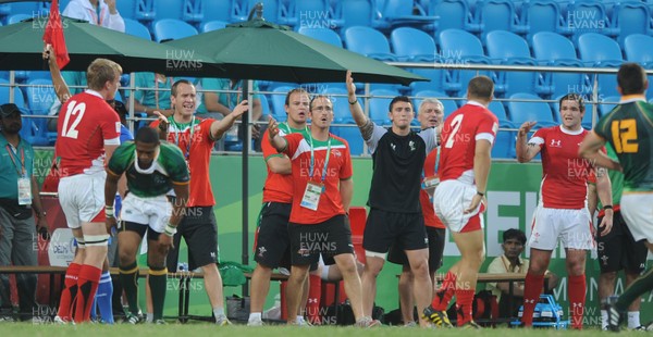 11.10.10 - South Africa v Wales - Commonwealth Games Sevens Delhi 2010 -  Wales sevens head coach Paul John(centre). 