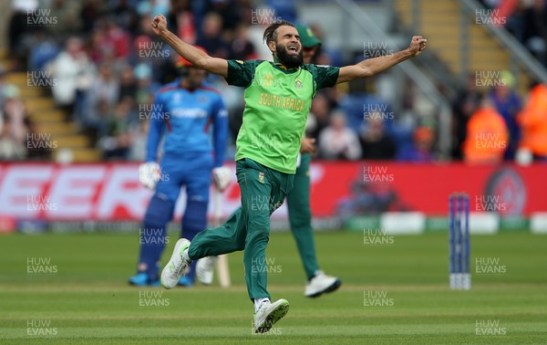 150619 - South Africa v Afghanistan - ICC Cricket World Cup 2019 - Imran Tahir of South Africa celebrates bowling and catching Asghar Afghan