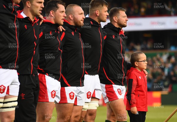 020722 - South Africa v Wales - Castle Lager Incoming Series 2022 First Test - Mascot Tomos Jones with Dan Biggar of Wales during the anthems