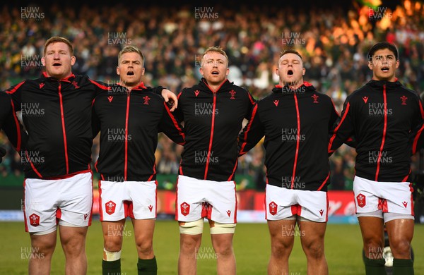 020722 - South Africa v Wales - Castle Lager Incoming Series 2022 First Test - Rhys Carre, Gareth Anscombe, Tommy Reffell, Dewi Lake, Louis Rees-Zammit of Wales during the anthems