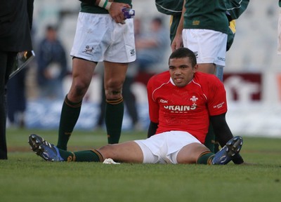 07.06.08 South Africa v Wales, Bloemfontein... South Africa's Bryan Habana claims a Welsh shirt at the end of the game. 