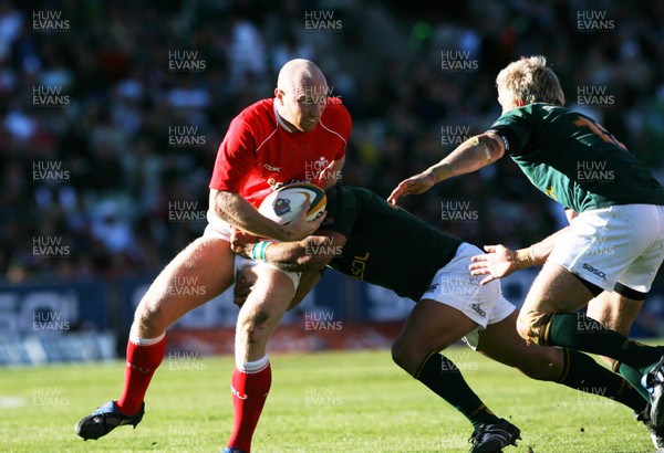 07.06.08 South Africa v Wales, Bloemfontein... Wales' Tom Shanklin is tackled by South Africa's Adrian Jacobs. 