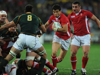 11.09.11 - South Africa v Wales - Rugby World Cup 2011 - Mike Phillips of Wales takes on Pierre Spies of South Africa. 