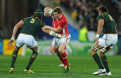 11.09.11 - South Africa v Wales - Rugby World Cup 2011 - Rhys Priestland of Wales takes on Victor Matfield of South Africa. 