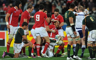 11.09.11 - South Africa v Wales - Rugby World Cup 2011 - Toby Faletau of Wales is congratulated after scoring try. 
