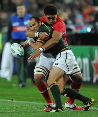 11.09.11 - South Africa v Wales - Rugby World Cup 2011 - Fourie du Preez of South Africa is tackled by Toby Faletau of Wales. 