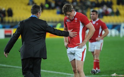 11.09.11 - South Africa v Wales - Rugby World Cup 2011 - Rhys Priestland of Wales is consoled by attack coach Rob Howley. 