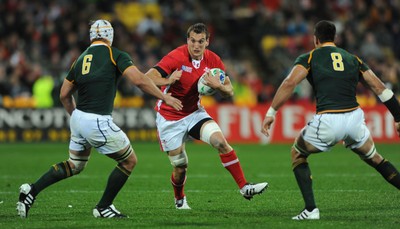 11.09.11 - South Africa v Wales - Rugby World Cup 2011 - Sam Warburton of Wales takes on Heinrich Brussow and Pierre Spies of South Africa. 