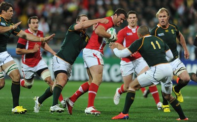 11.09.11 - South Africa v Wales - Rugby World Cup 2011 - Jamie Roberts of Wales drives through. 